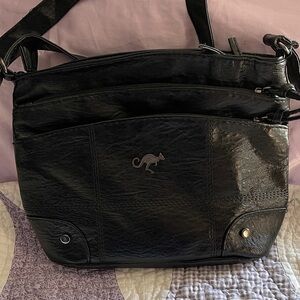 Kangaroo emblem Black Soft Bag with several pockets for storage